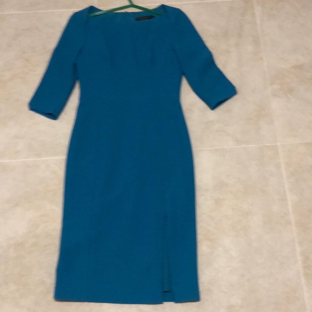 Black Halo Teal dress. Size 4.  Zippered slit in front of dress.